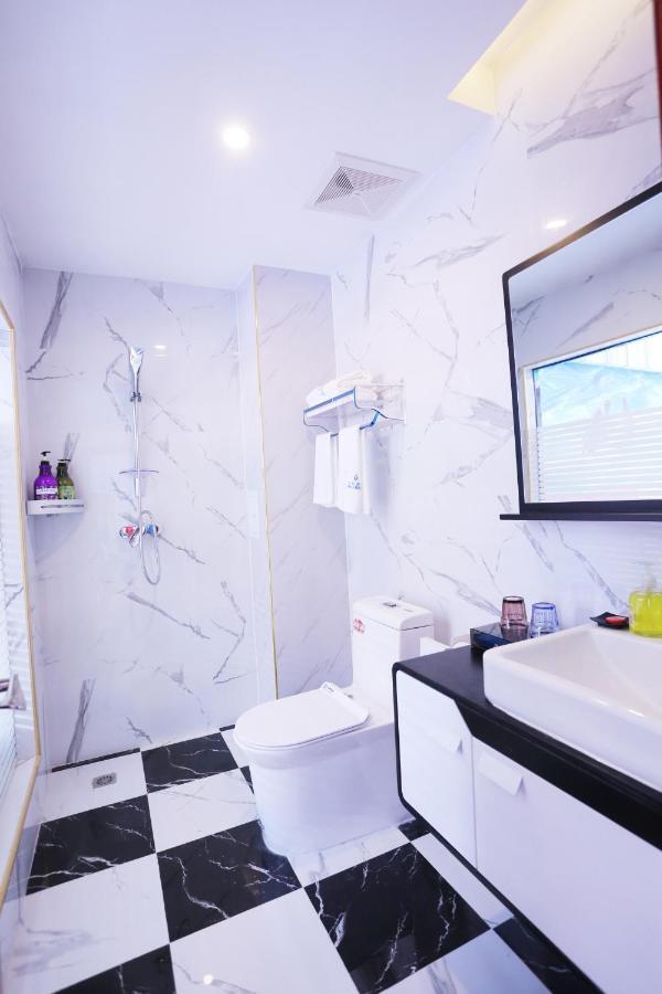 Kunming Mengda Holiday Hotel Bagian luar foto